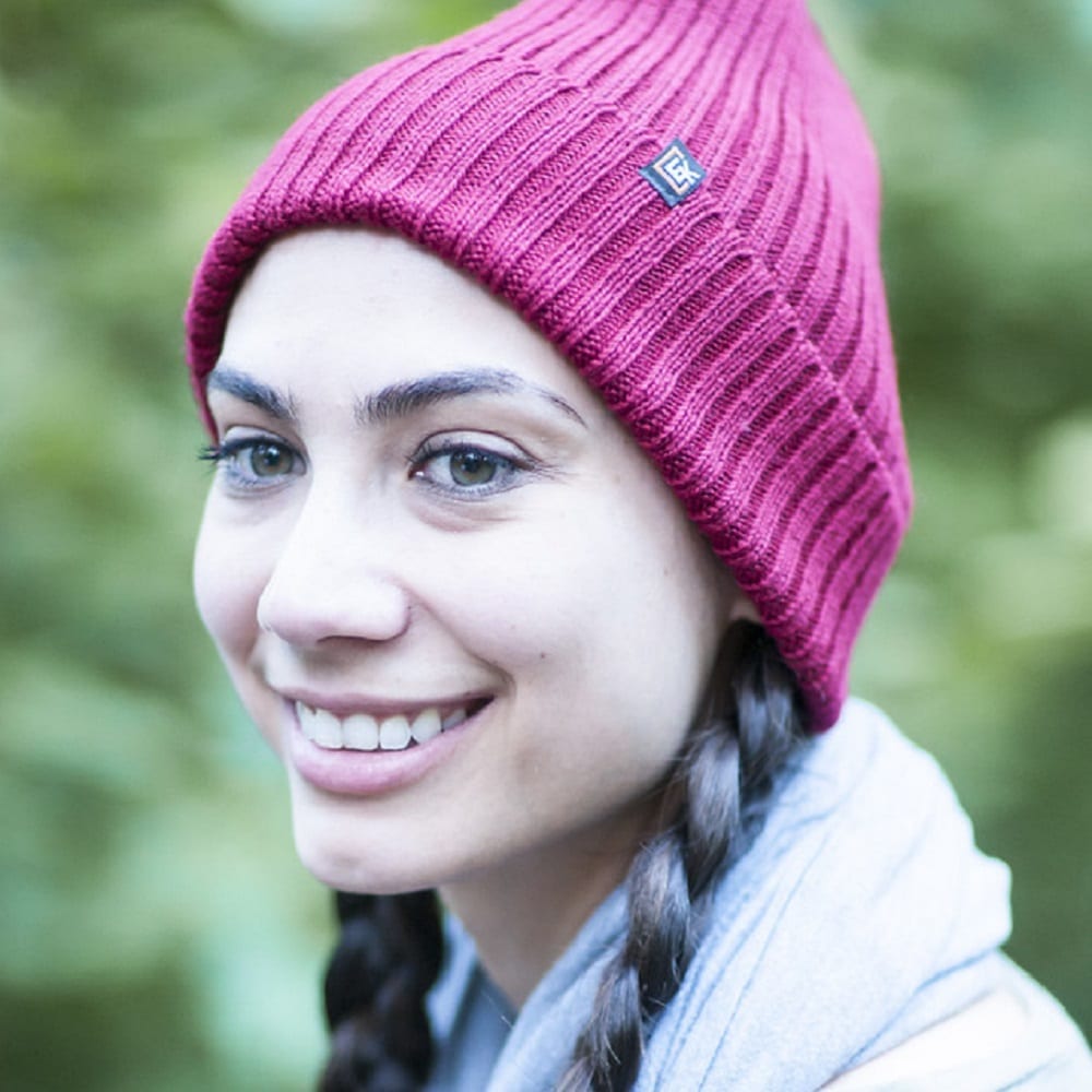 Girl wearing a cable knit hat